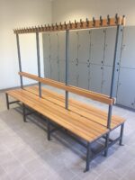 "Professional double-sided locker room bench with natural wood slats, central backrest, and integrated coat hooks on a grey metal frame."