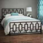 Elegant black double metal bed with a geometric headboard design and industrial-strength steel frame for modern master bedrooms.