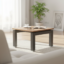 Modern minimalist four-legged side table with a square top and sturdy chassis for café and restaurant lounge areas.