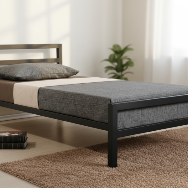 Minimalist single black metal bed frame with a sturdy headboard and matte finish for modern Egyptian homes.