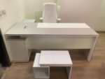 Modern all-wood white executive office desk with L-shape side cabinet and matching coffee table for manager offices.