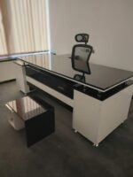 Luxury black and white high-gloss executive wood desk with side cabinet and coffee table by Quality Furniture Egypt.