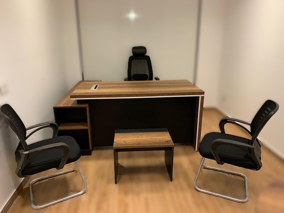Premium walnut and black executive wooden desk with L-shaped side cabinet and matching coffee table by Quality Furniture.
