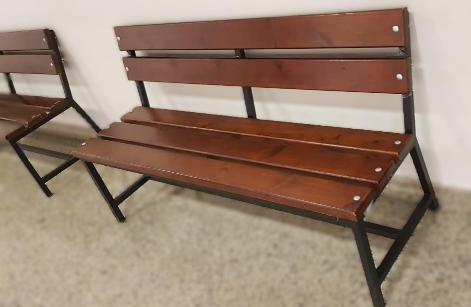 Industrial outdoor metal and wood bench for parks, clubs, and open-air seating areas by Quality Furniture Egypt.