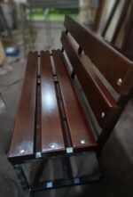 Industrial outdoor metal and wood bench for parks, clubs, and open-air seating areas by Quality Furniture Egypt.
