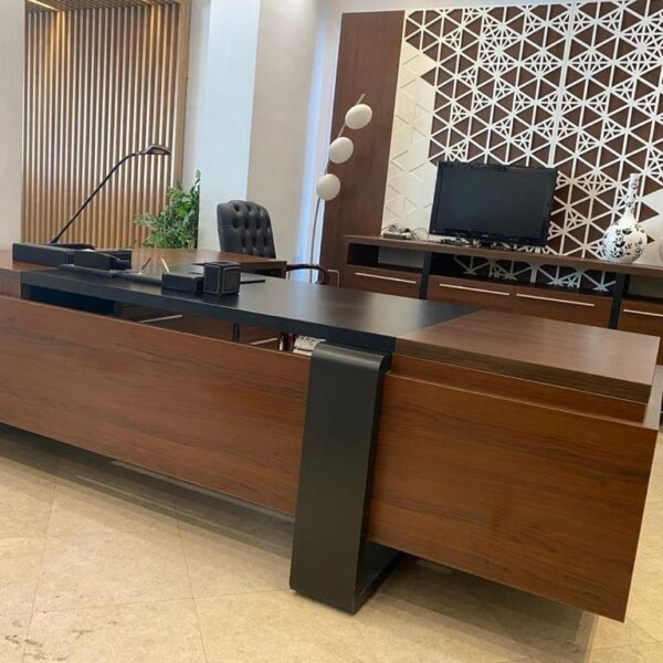 "Handcrafted executive office desk made of natural solid wood, featuring a luxury walnut finish, thick desktop, and modern architectural design with integrated side cabinet."